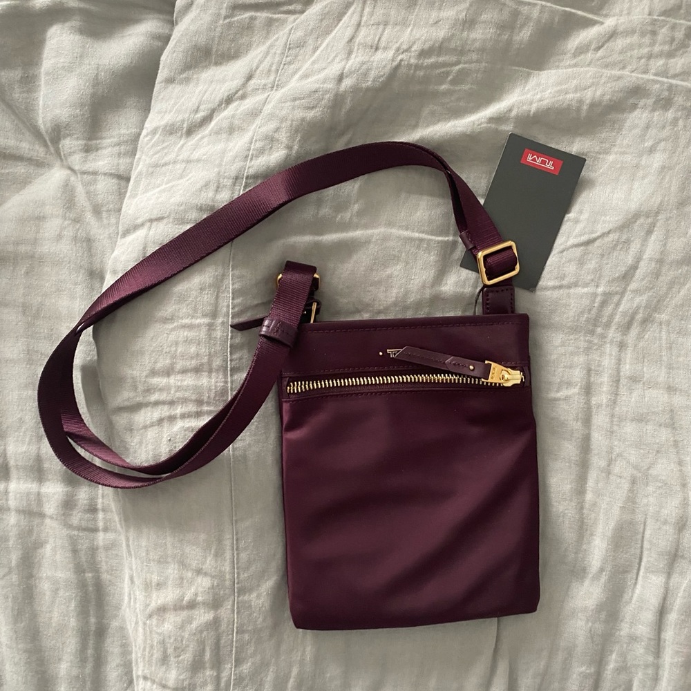 Purple Tumi Crossbody Bag
